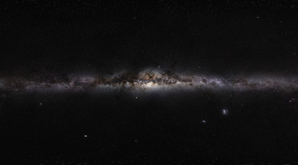 simulations-find-ghostly-whirls-of-dark-matter-trailing-galaxy-arms