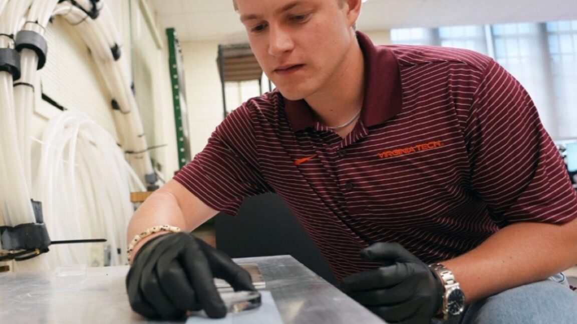 ice-discs-slingshot-across-a-metal-surface-all-on-their-own